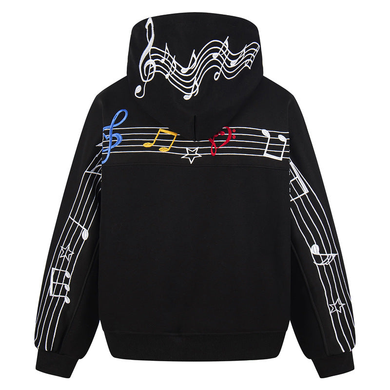 White hooded sweatshirt embroidered with musical notes