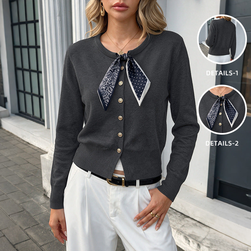 Round neck cardigan paired with scarf sweater